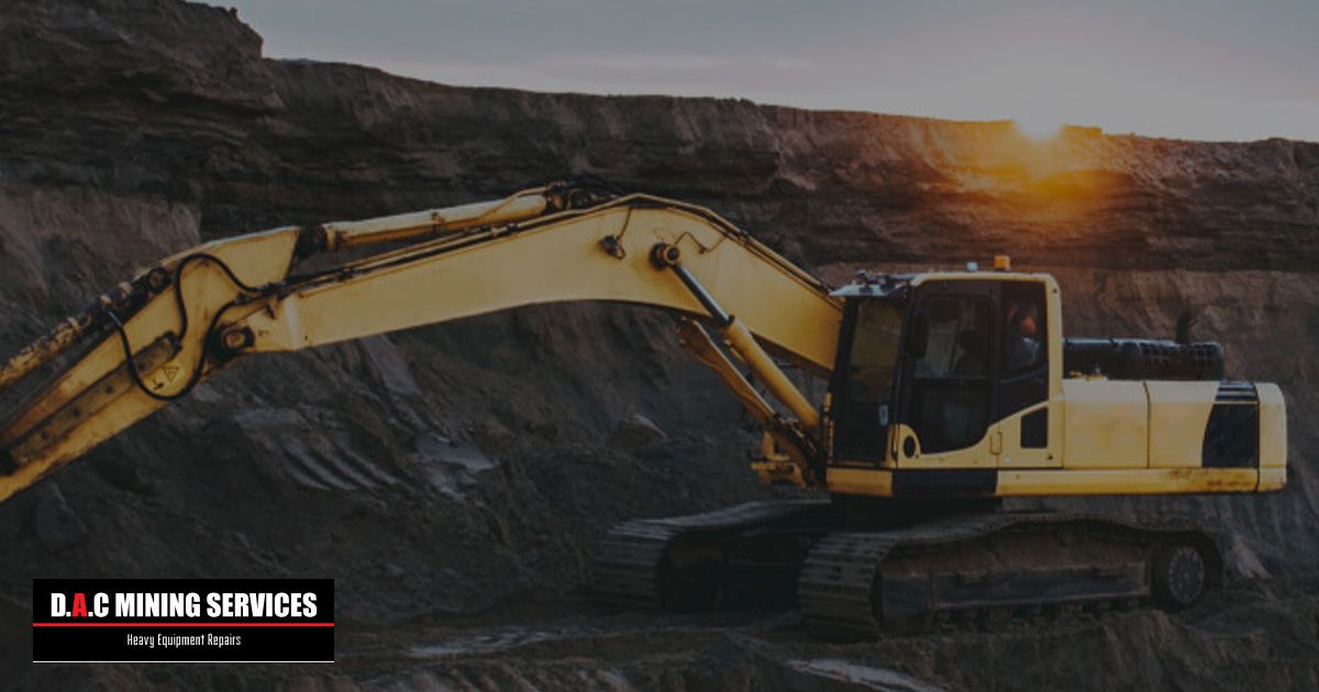 An excavator digging on a mining site - D.A.C Mining Services